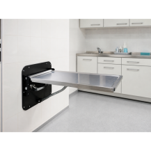 Diagnostyczno-zabiegowy stół ścienny POT-150, stal nierdzewna, 75 kg — w gabinecie weterynaryjnym