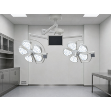 Lampa operacyjna LED dwuczaszowa sufitowa YDE700/700 F TYPE – „kwiat”, bezcieniowa — w gabinecie weterynaryjnym